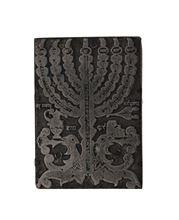 Picture of Copper Mould with engraving of a LaMenatz’each in the shape of a Menorah. Beginning of the 20th century.